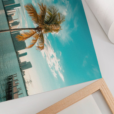 Moderne decoratieve poster Palmbomen, meer, wolkenkrabbers, turkooizen lucht, rust