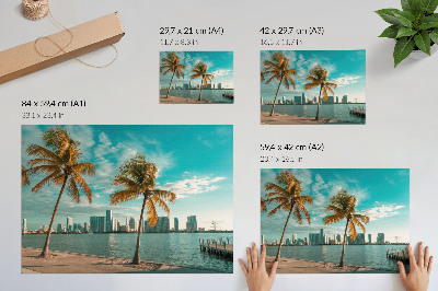Moderne decoratieve poster Palmbomen, meer, wolkenkrabbers, turkooizen lucht, rust