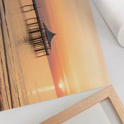 Poster zonsondergang boven het water met een prachtig uitzicht
