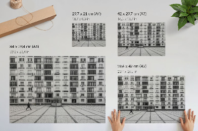 Stijlvolle wandposter Een modern gebouw met balkons en een plein.