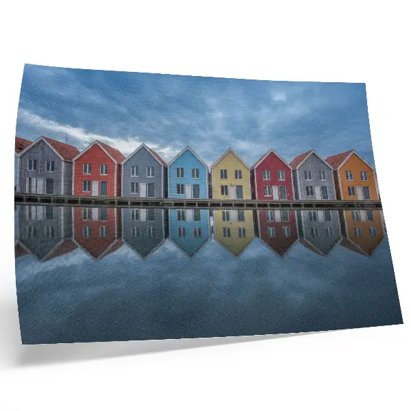 Moderne decoratieve poster met symmetrische kleurrijke huizen