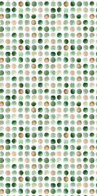 Binnenrolgordijn voor raam met groene cirkels