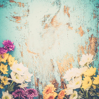 Rolgordijn voor balkondeur met bloemen op een blauwe achtergrond