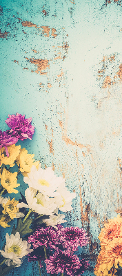 Rolgordijn voor balkondeur met bloemen op een blauwe achtergrond