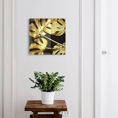 Sleutelkastje binnen Monstera-bladeren
