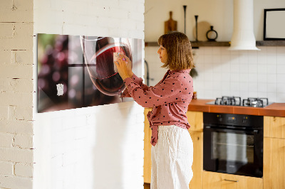 Magneet bord Een glas rode wijn