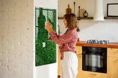 Decoratief glazen wandbord beschrijfbaar en magnetisch met motief van een haag van bladeren