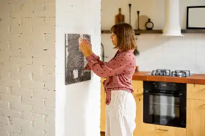 Decoratief glazen wandbord beschrijfbaar en magnetisch met jaarringen motief