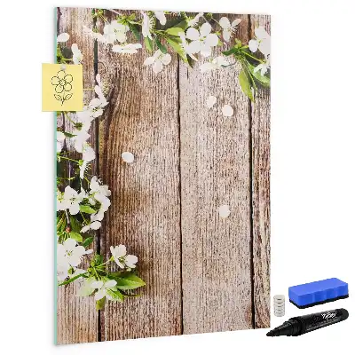 Glazen magneetbord met decoratieve print van bloemen op houten planken