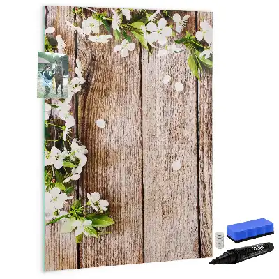 Glazen magneetbord met decoratieve print van bloemen op houten planken