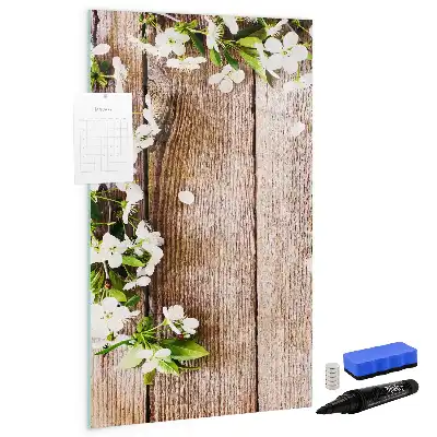 Glazen magneetbord met decoratieve print van bloemen op houten planken