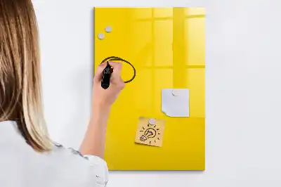 Glazen magneetbord met decoratieve print in de kleur lichtgeel