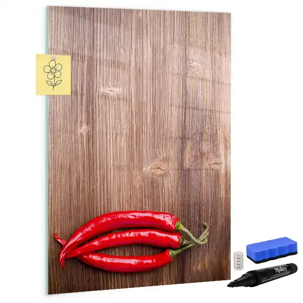 Magnetisch glazen memobord met afbeelding van chilipepers op een houten plank