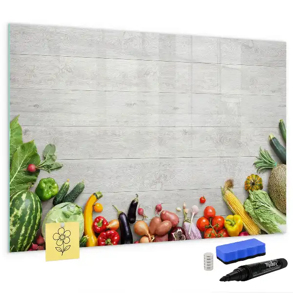 Magnetisch glazen schrijfbord met print van groenten op tafel