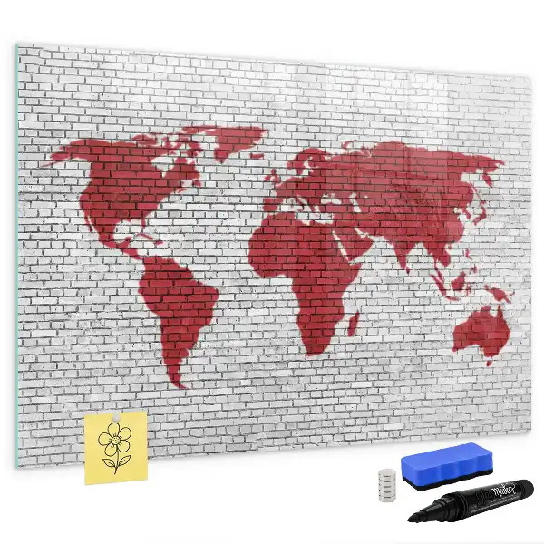 Magnetisch glazen schrijfbord met print van een wereldkaart op een bakstenen muur