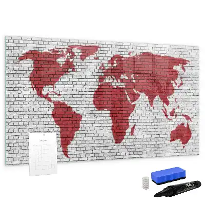 Magnetisch glazen schrijfbord met print van een wereldkaart op een bakstenen muur