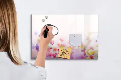 Beschrijfbaar glazen magneetbord met design bloemen op een weide