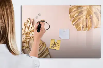Beschrijfbaar glazen magneetbord met decoratieve gouden tropische bladeren