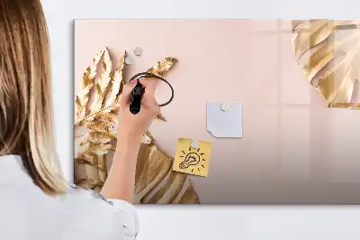 Beschrijfbaar glazen magneetbord met decoratieve gouden tropische bladeren
