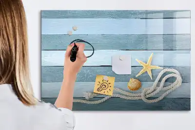 Beschrijfbaar glazen magneetbord met een design van planken met planten en schelpen