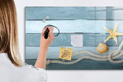 Beschrijfbaar glazen magneetbord met een design van planken met planten en schelpen