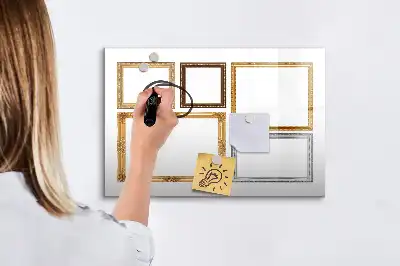 Beschrijfbaar glazen magneetbord met een gouden frame