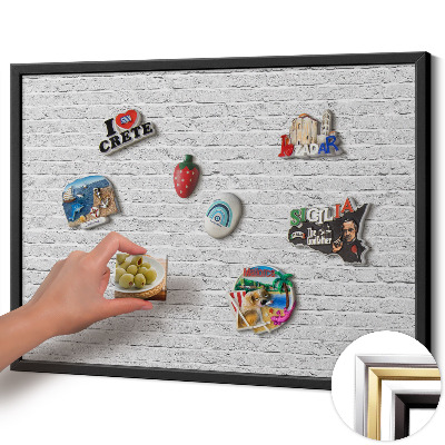 Magnetisch bord met zwarte rand Bakstenen muur, lichte muur