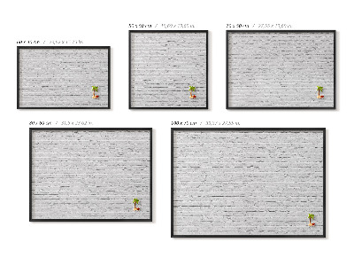 Magnetisch bord met zwarte rand Bakstenen muur, lichte muur