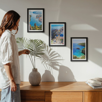 Gallery wall Uitzicht op de Griekse kust en het stadje Oia op Santorini.