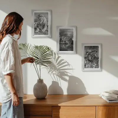 Gallery wall met wilde dieren van de savanne zoals een leeuw, jaguar en zebra