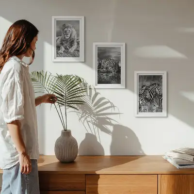 Gallery wall met wilde dieren van de savanne zoals een leeuw, jaguar en zebra