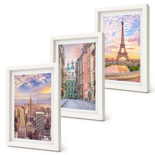 Gallery wall Uitzicht op de steden New York, Parijs en Warschau bij zonsondergang.