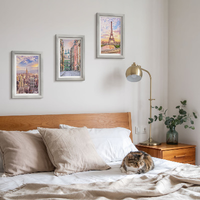 Gallery wall Uitzicht op de steden New York, Parijs en Warschau bij zonsondergang.