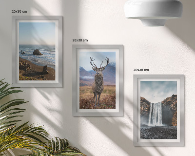 Gallery wall Berglandschap met een waterval, een hert en een strand.