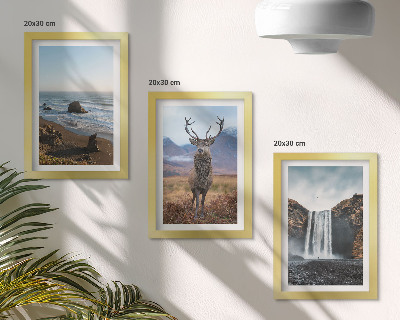 Gallery wall Berglandschap met een waterval, een hert en een strand.