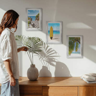 Gallery wall Vakantiebeelden van het strand, de golven en palmbomen in de tropen.