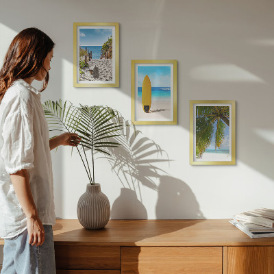 Gallery wall Vakantiebeelden van het strand, de golven en palmbomen in de tropen.
