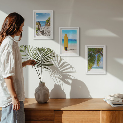 Gallery wall Vakantiebeelden van het strand, de golven en palmbomen in de tropen.