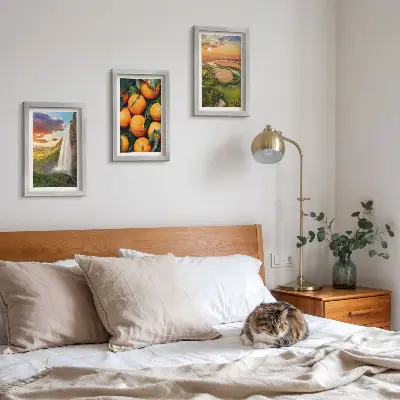 Gallery wall met een Italiaans landschap van een waterval, bergen en sinaasappels bij zonsondergang