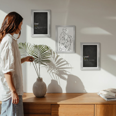 Gallery wall Familielijnkunst met definities van liefde en vaderschap.