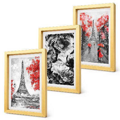 Gallery wall Grijze schilderijen van de Eiffeltoren met rode accenten.