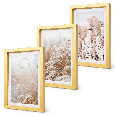 Gallery wall Grasvelden in delicate tinten bruin en beige.
