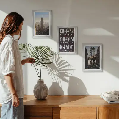 Gallery wall met landschappen van New York City en een inspirerend citaat