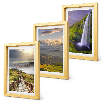 Set van ingelijste schilderijen Schilderachtige berglandschappen met een waterval en een pad.