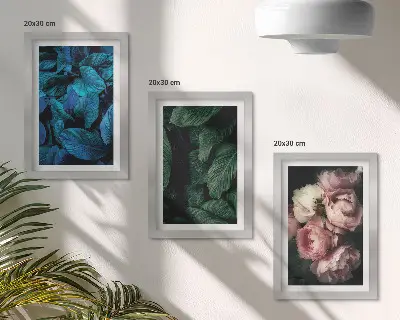 Set ingelijste schilderijen met bladeren en bloemen in verschillende kleuren