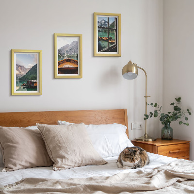 Gallery wall Bergmeer met een boot en houten huisjes