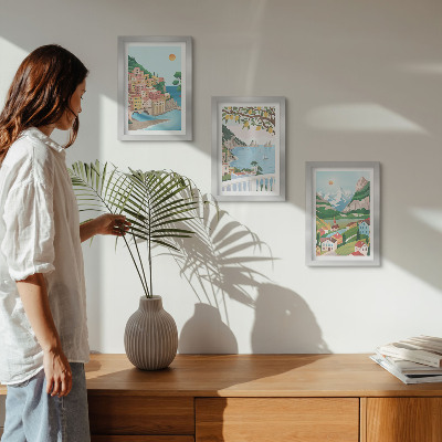 Set van ingelijste schilderijen Uitzicht op zee met pastelkleurige huizen