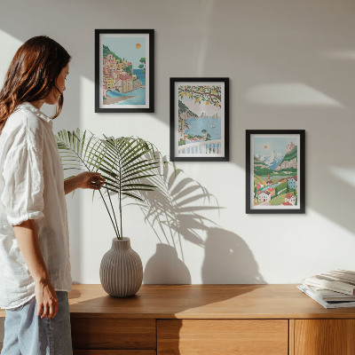 Set van ingelijste schilderijen Uitzicht op zee met pastelkleurige huizen