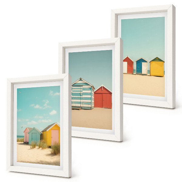 Set van ingelijste schilderijen Kleurrijke strandhuisjes op een zonnige dag.