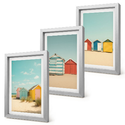 Set van ingelijste schilderijen Kleurrijke strandhuisjes op een zonnige dag.